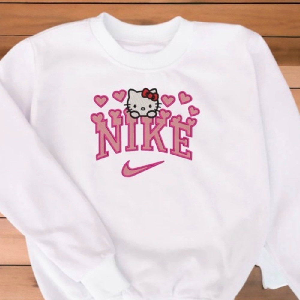 Nike White Sweatshirt with Pink Hello Kitty Graphic